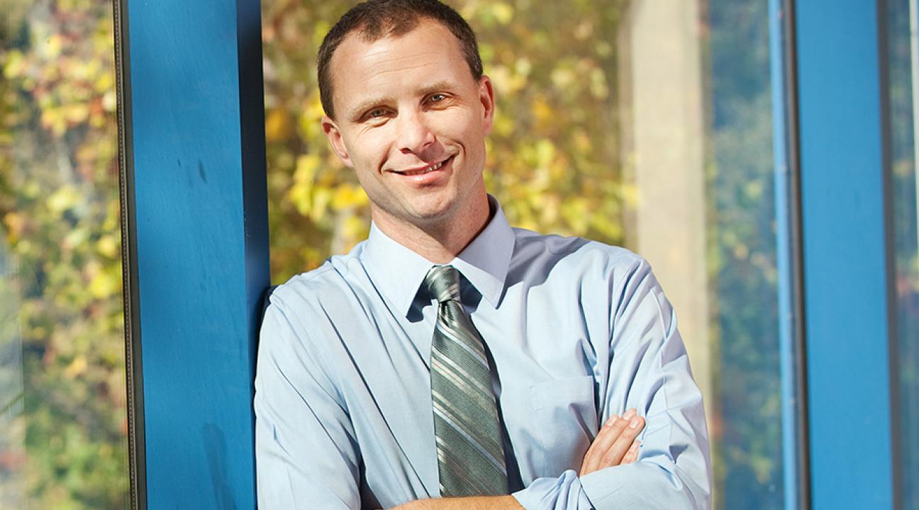Dr. Merlin Hanauer, Professor of Economics