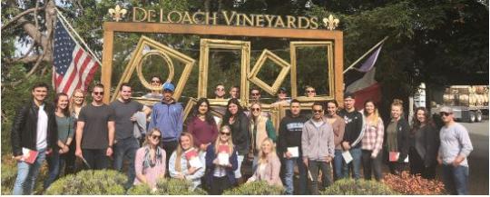 Undergraduate students touring Deloach Winery in 2019